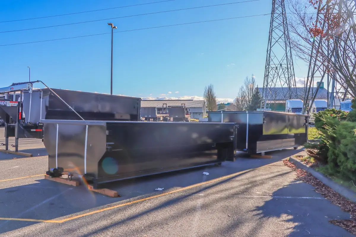 Roll-off dumpster ready for waste disposal at job site for 12 Yard Dumpster Rental in Irvington